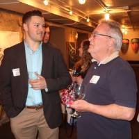 two men continue to speak